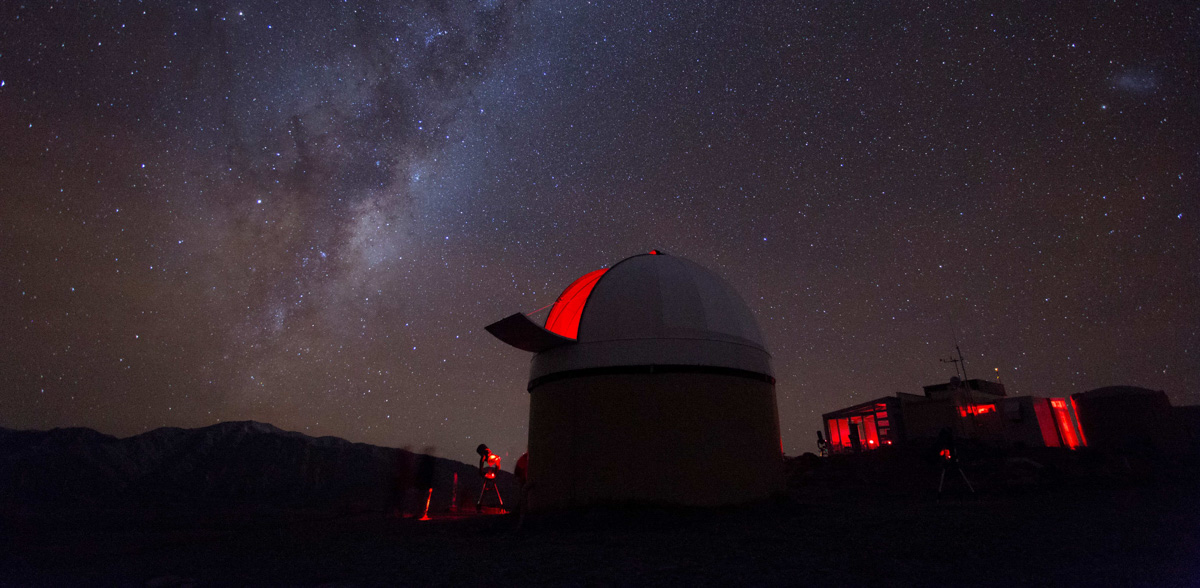 Evening sky with milky way and observatory building in the foreground